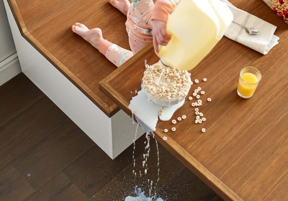Girl spilled milk | Big Bob's Flooring Outlet